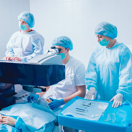 group of doctors examining patient before sugery